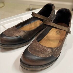 Naot Brown and Black Flats with Brogue Detailing
